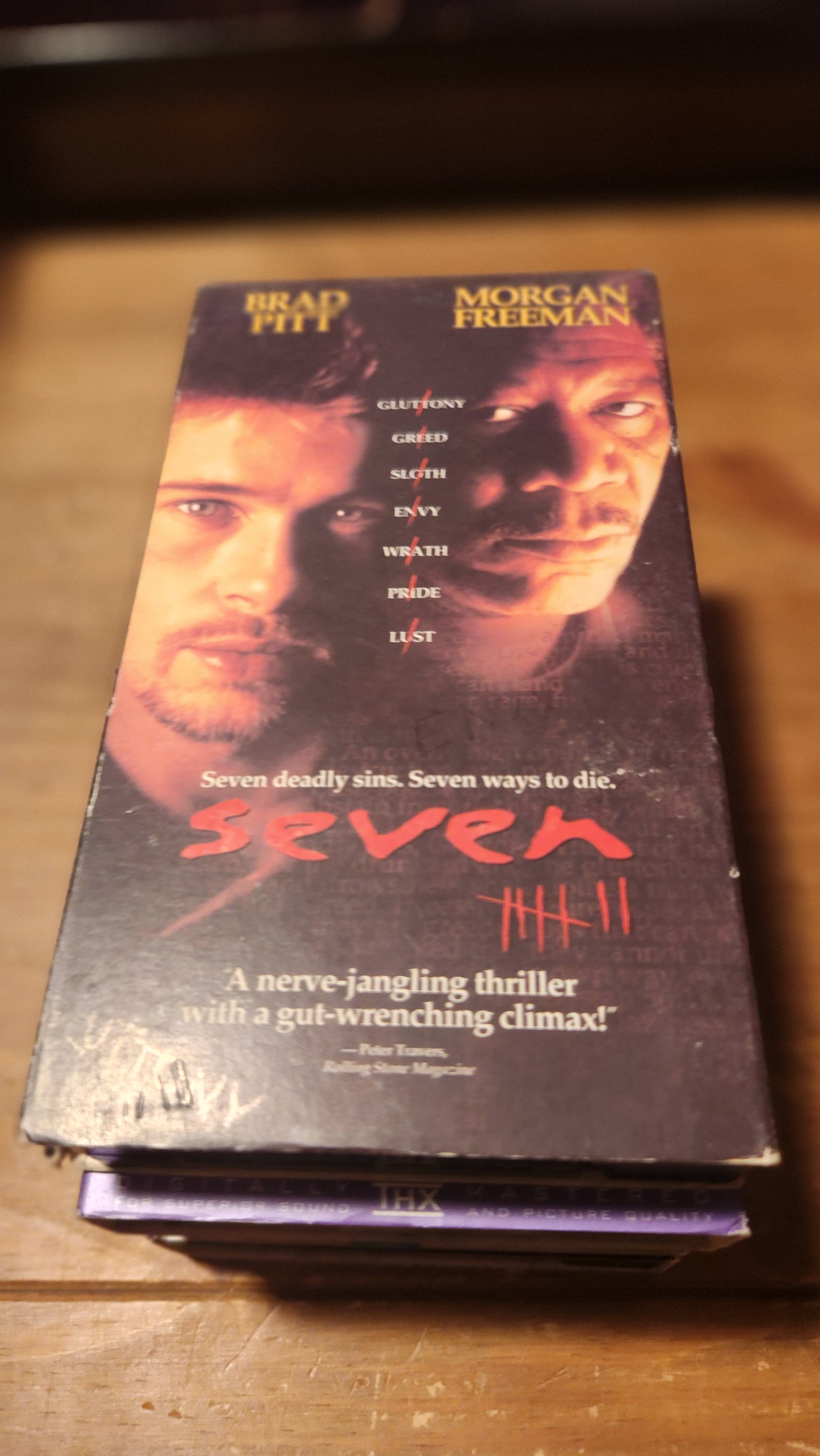 SEVEN VHS collectible tape featuring Brad Pitt and Morgan Freeman in a thriller movie cover