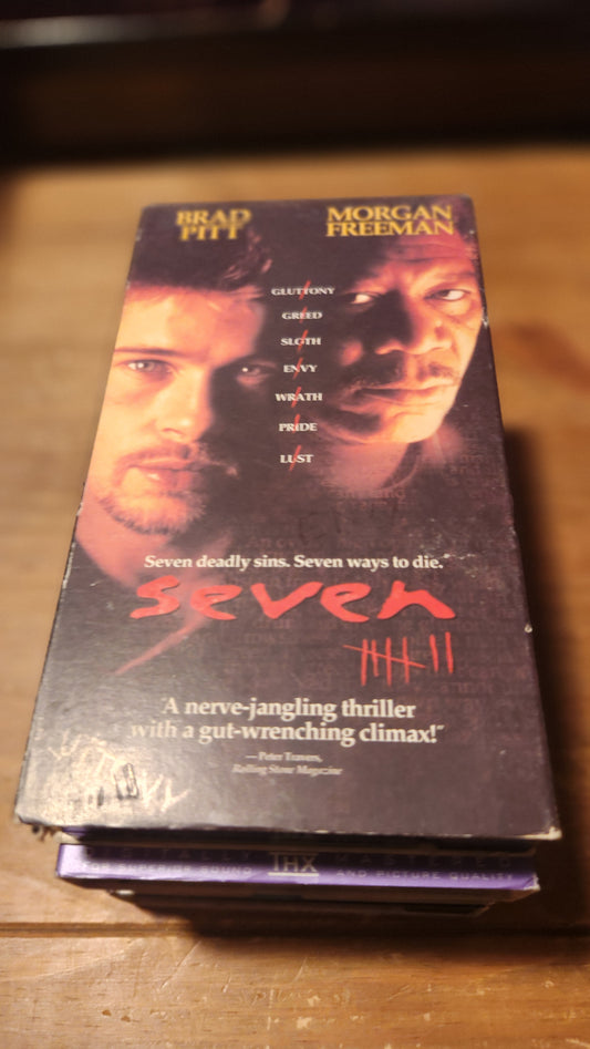 SEVEN VHS collectible tape featuring Brad Pitt and Morgan Freeman in a thriller movie cover