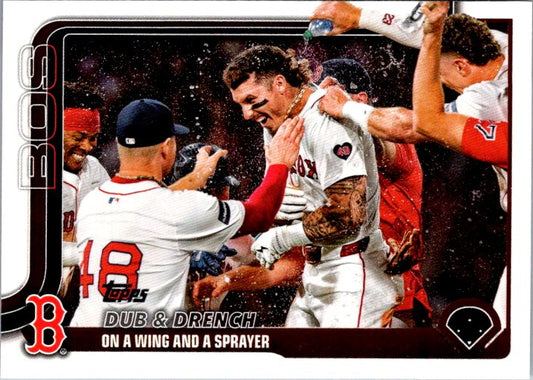 Topps 312 Boston Red Sox collectible baseball card featuring players celebrating a victory