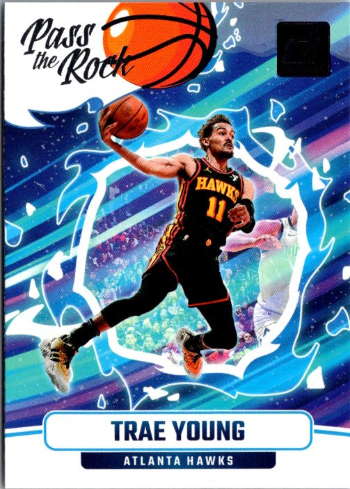 Trae Young trading card featuring dynamic action shot in Atlanta Hawks uniform