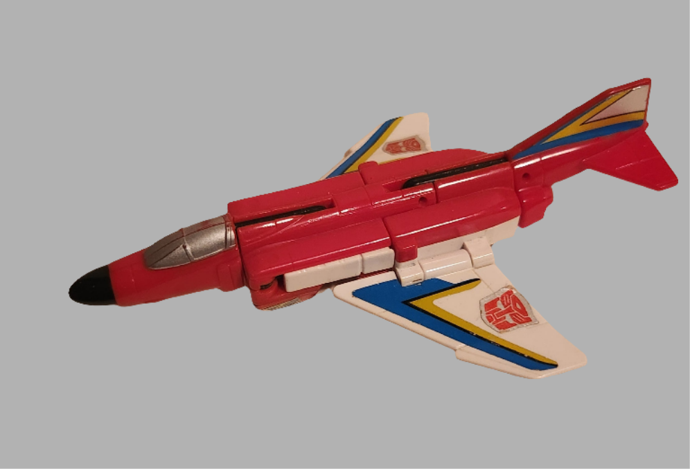 Fireflight Aerialbots Transformer collectible in red, white, and blue, designed as a jet with detailed features