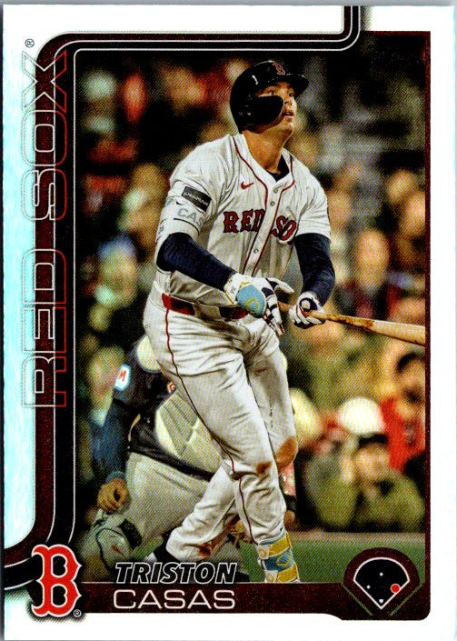 Triston Casas trading card featuring the Red Sox player swinging a bat during a game