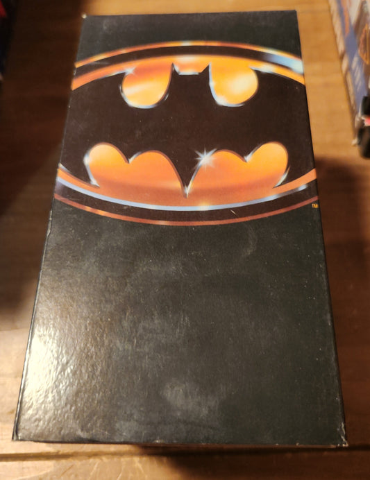 Vintage Batman VHS tape with iconic black and orange Batman logo from Lawrence's Collectibles